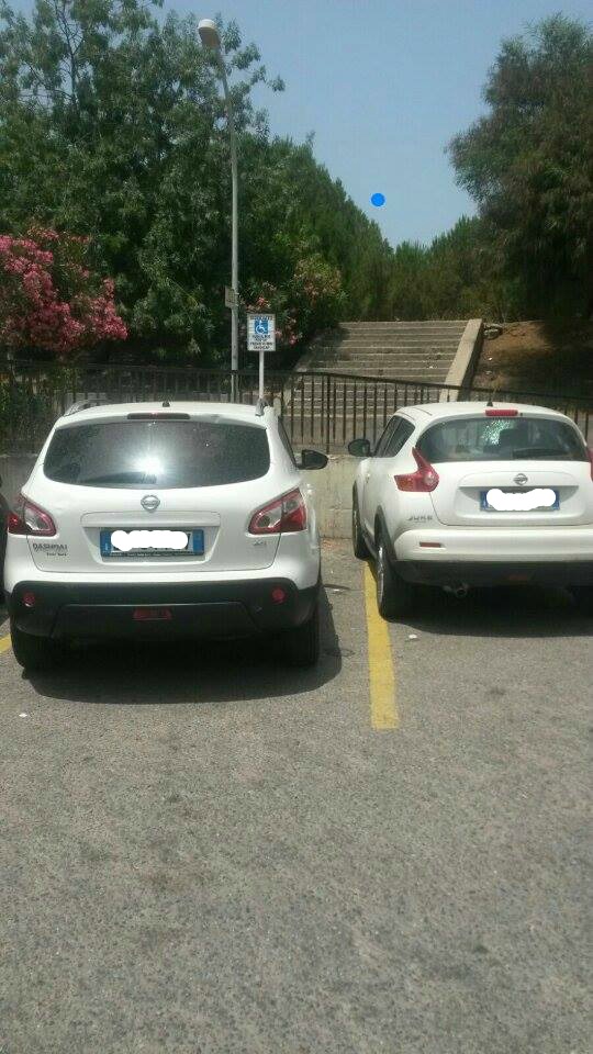 posto auto disabili occupato